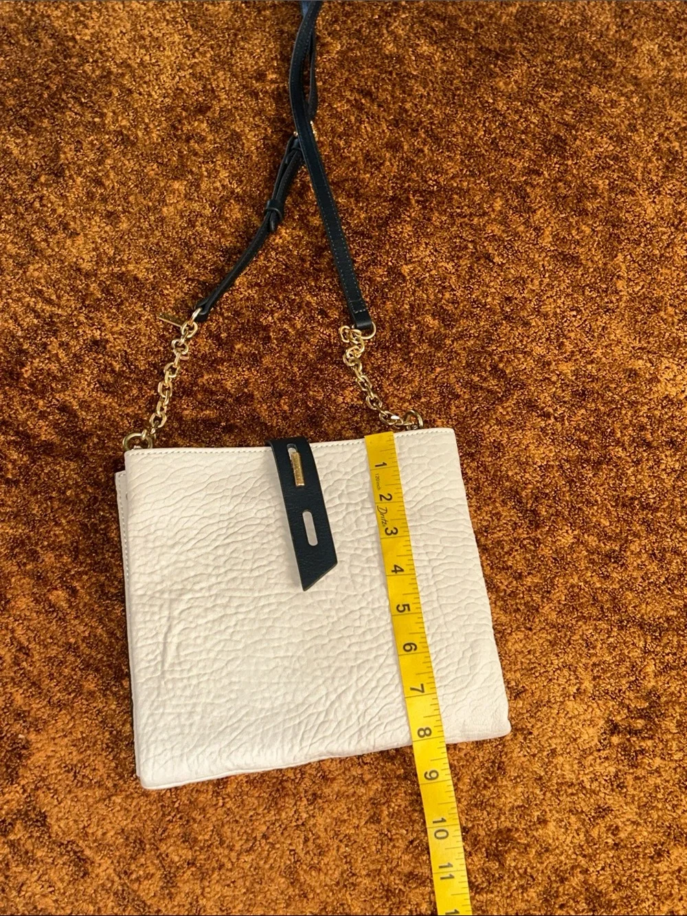Cream Crossbody Bag with Black Strap and Gold Chain Accent